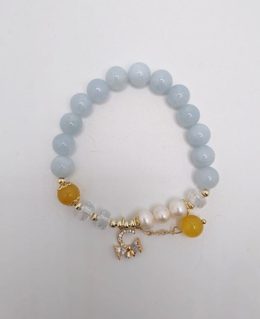 Light Blue Beaded Bracelet with Bow Tie