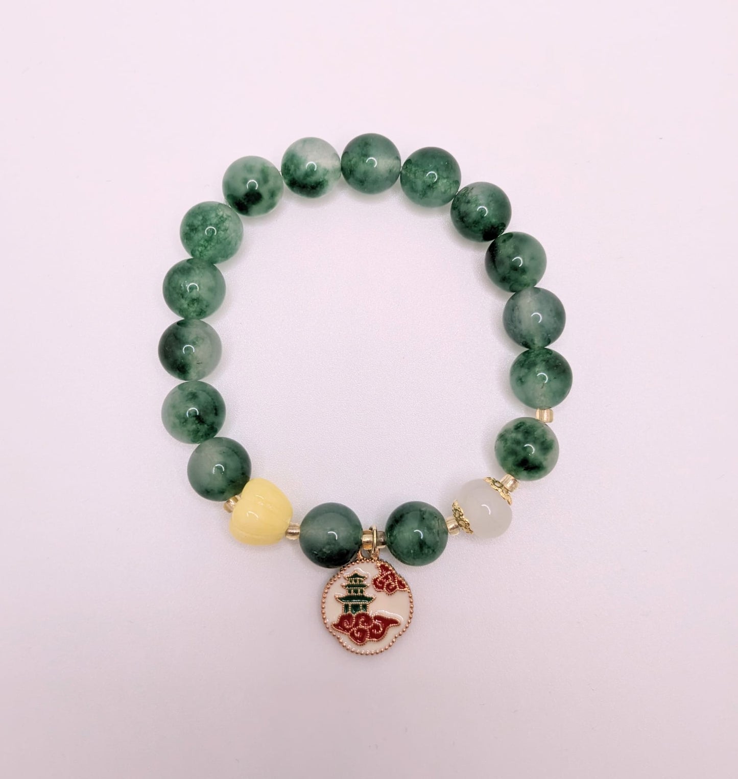 Green Beaded Bracelet with Temple on Clouds